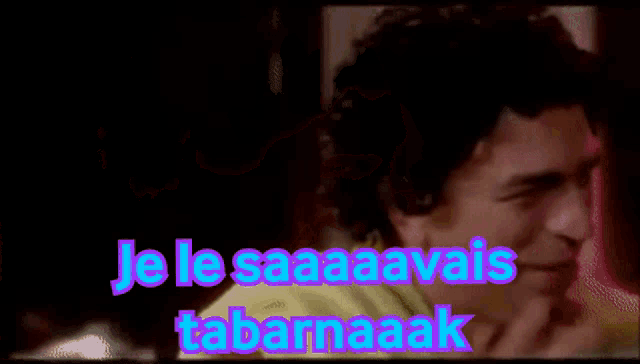 a man kissing a woman with the words je le saaaaavais tabarnaak written on the bottom