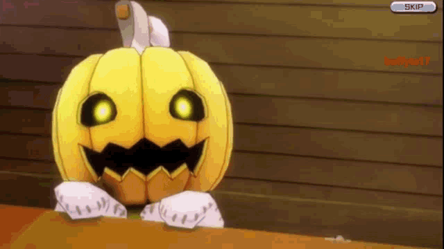 a yellow pumpkin with glowing eyes sits on a table