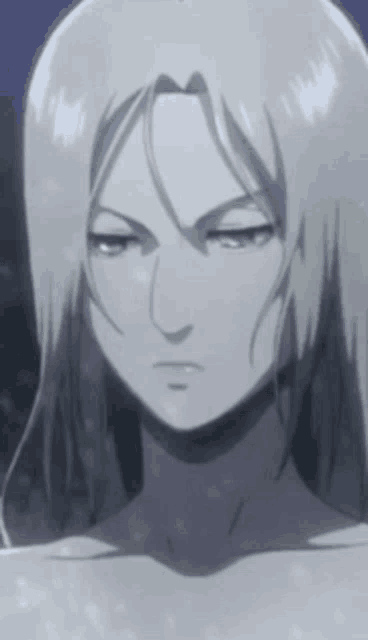a close up of a woman 's face with long white hair