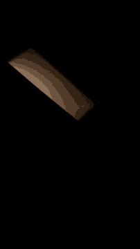 a dark room with a light shining through a window