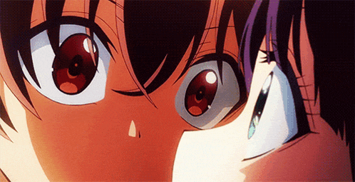 a close up of a person 's eyes with a tear running down their cheek