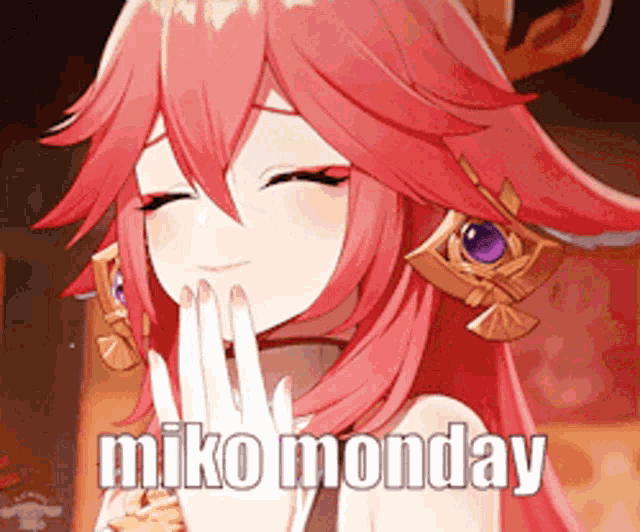 a girl with red hair is holding her hand to her mouth and says miko monday .