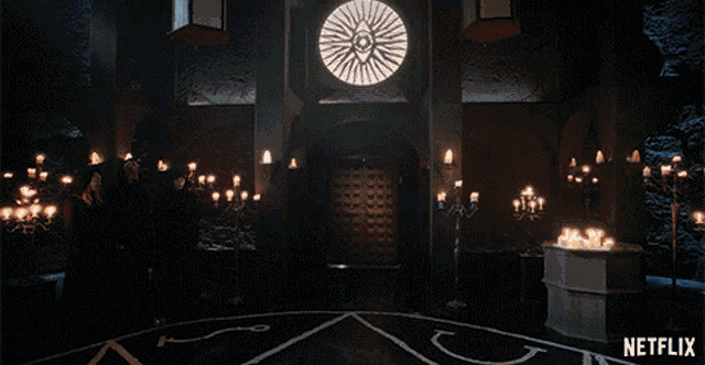 a dark room with candles and a netflix logo