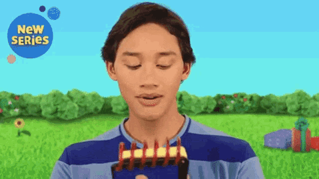 a man in a blue striped shirt is holding a notebook with a new series logo in the corner .