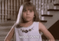 a young girl in a white dress is standing in front of a staircase and says woa is me .