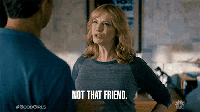 a woman talking to a man with the words not that friend
