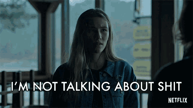 a woman in a denim jacket says " i 'm not talking about shit " in a netflix ad