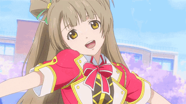 a girl with long brown hair is wearing a red and white outfit