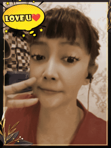 a woman 's face is behind a speech bubble that says love u