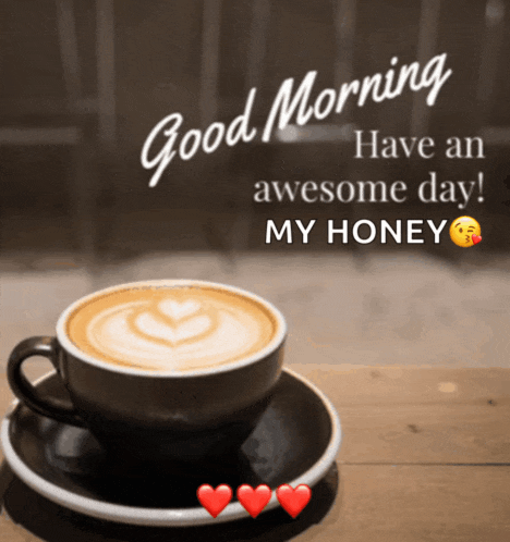 a cup of coffee on a saucer with the words good morning have an awesome day