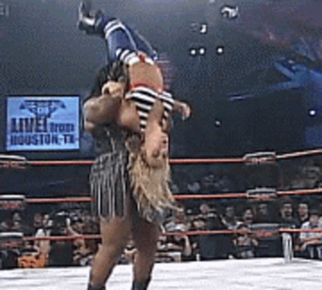 a wrestling match is being broadcast live from houston tx