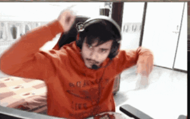 a man wearing headphones and a red shirt that says ' life '