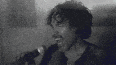 Singing John Oates GIF - Singing John Oates Pushin A Rock Song GIFs