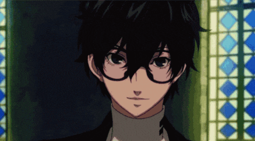 a close up of a person wearing glasses and a suit