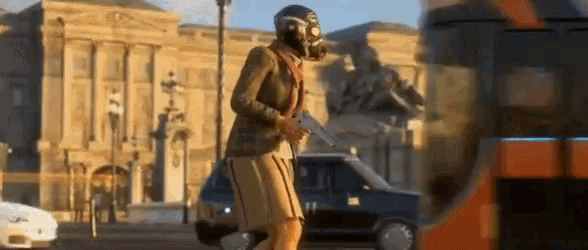a man wearing a gas mask is walking down a street