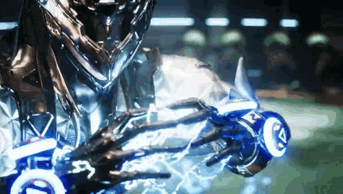 a man in a futuristic suit is holding a can of redbull