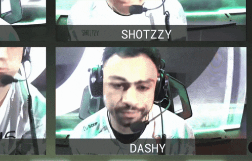 a man wearing a headset with the name shotzzy on the top