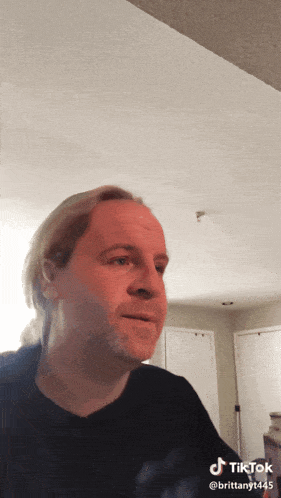 a man 's face is shown in a tiktok video taken by brittany1441