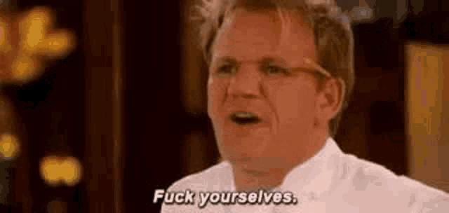 a man in a white shirt and glasses is talking to someone and saying `` fuck yourselfs '' .