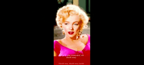 a close up of a woman in a pink dress with a caption that says `` there is the moment oh thrill me '' .
