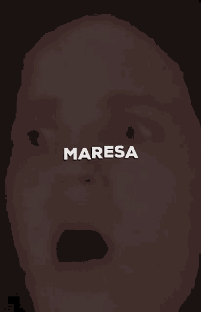 a close up of a woman 's face with the word maresa written above it