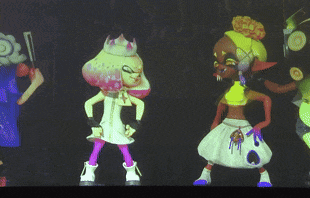 a group of cartoon characters are dancing in a dark room