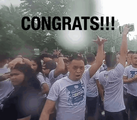 a group of people are celebrating with the words congrats written on the top