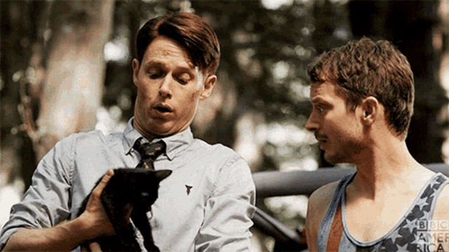 Cat Cat Weapon GIF - Cat Cat Weapon Dirk Gentlys Holistic Detective Agency GIFs