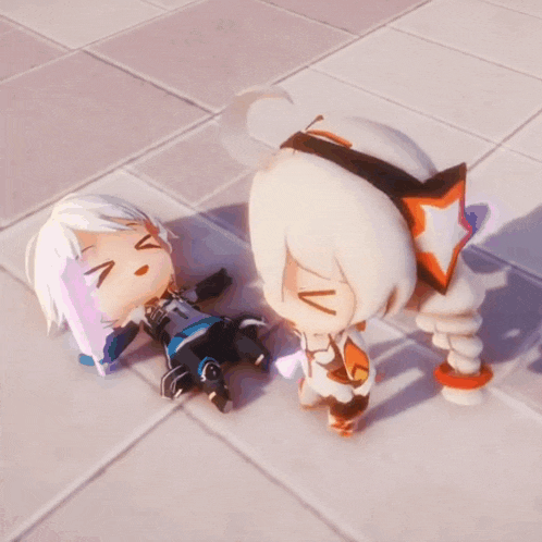 a cartoon character laying on the ground with a smiley face