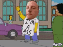 a man in a cartoon holding a sign that says i 'm a ass