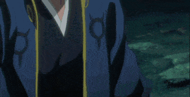 a close up of a person 's hands with a blue shirt