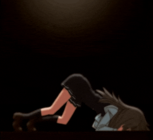 a girl in a school uniform is laying on her stomach on the floor .