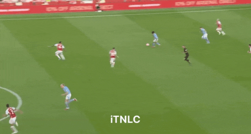 a blurry picture of a soccer game with the words itnlc at the bottom