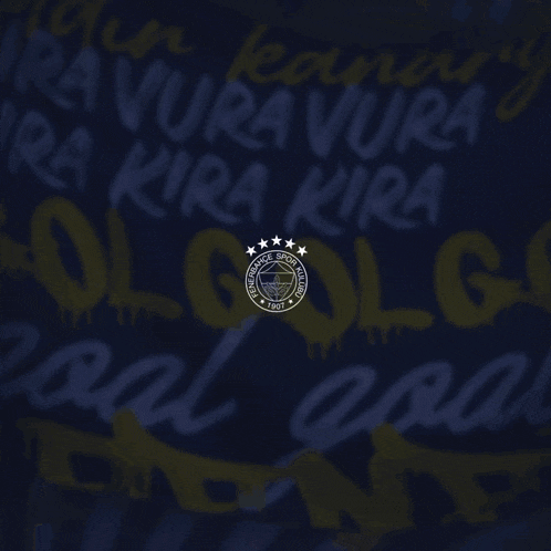 a man wearing a yellow and blue striped shirt with the word otokoc on the front