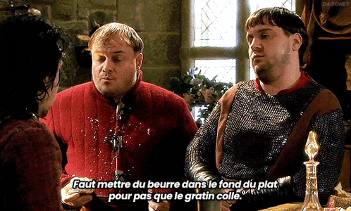 two men standing next to each other with one saying faut mettre du beurre dans le fond du plat pour pas que le gratin colle .