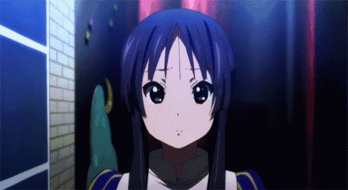 a close up of a girl with purple hair
