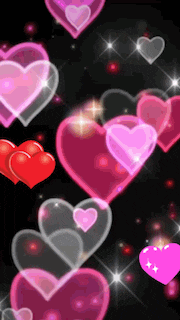 a black background with pink and red hearts floating in the air