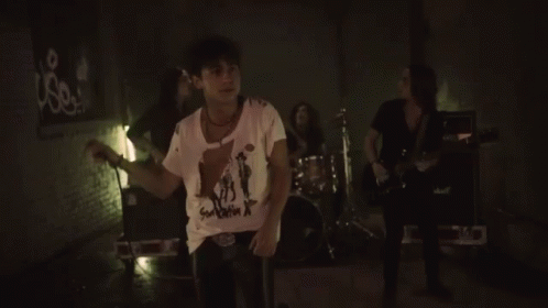 Band Singer GIF - Band Singer Ripped Clothes GIFs