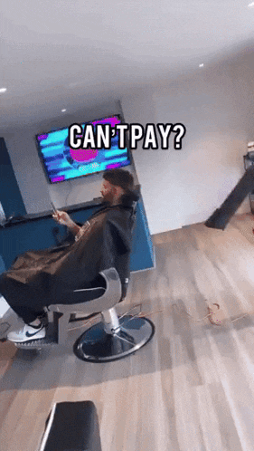 a man is sitting in a barber chair with the words can t pay on the bottom