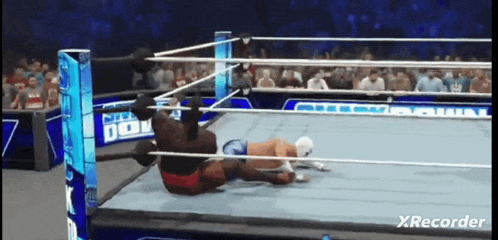 a video of a wrestling match with the words xrecorder on the bottom right