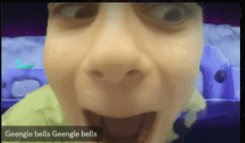 a close up of a person 's face with the words geengle bells geengle bells on the bottom