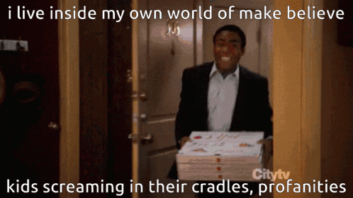 a man in a suit is holding a stack of pizzas in front of a door that says citytv on it