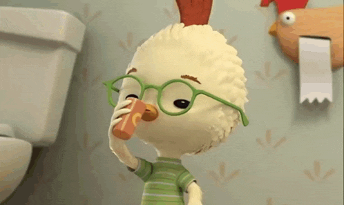 a cartoon chicken wearing glasses is drinking from a can in a bathroom .