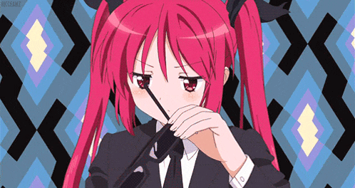 a girl with red hair is wearing glasses and a suit and tie