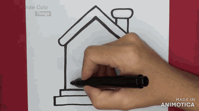 a person is drawing a house with a chimney on a piece of paper made in animatica