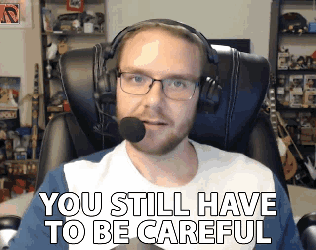 a man wearing headphones and a microphone says you still have to be careful