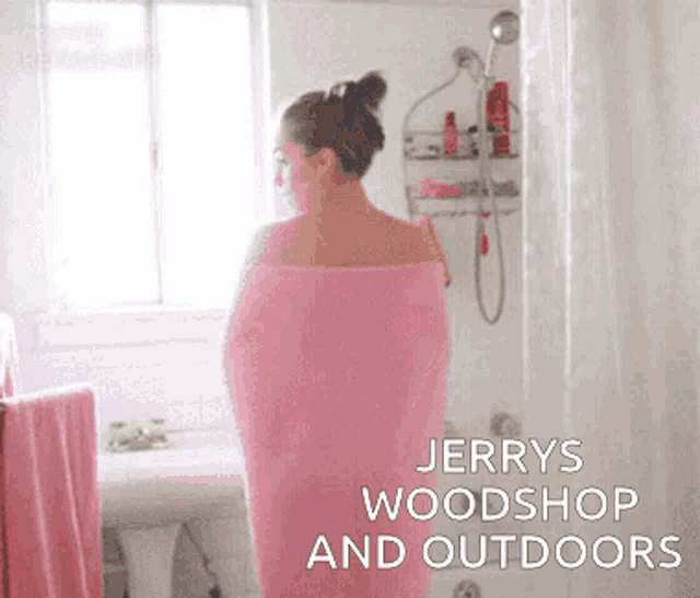 a woman wrapped in a pink towel in a bathroom with the words jerry 's woodshop and outdoors below her