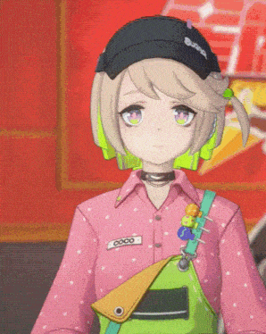 a girl in a pink shirt has a name tag that says coco on it
