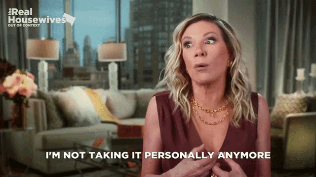 a woman says i 'm not taking it personally anymore in front of a couch