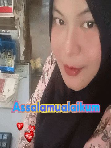 a woman wearing a hijab with the words assalamualaikum on the bottom right